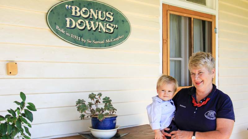 Madonna Connolly with her grandson Benjamin Wilkinson at the entrance to the Bonus Downs Homestead. Picture: Lucy Kinbacher