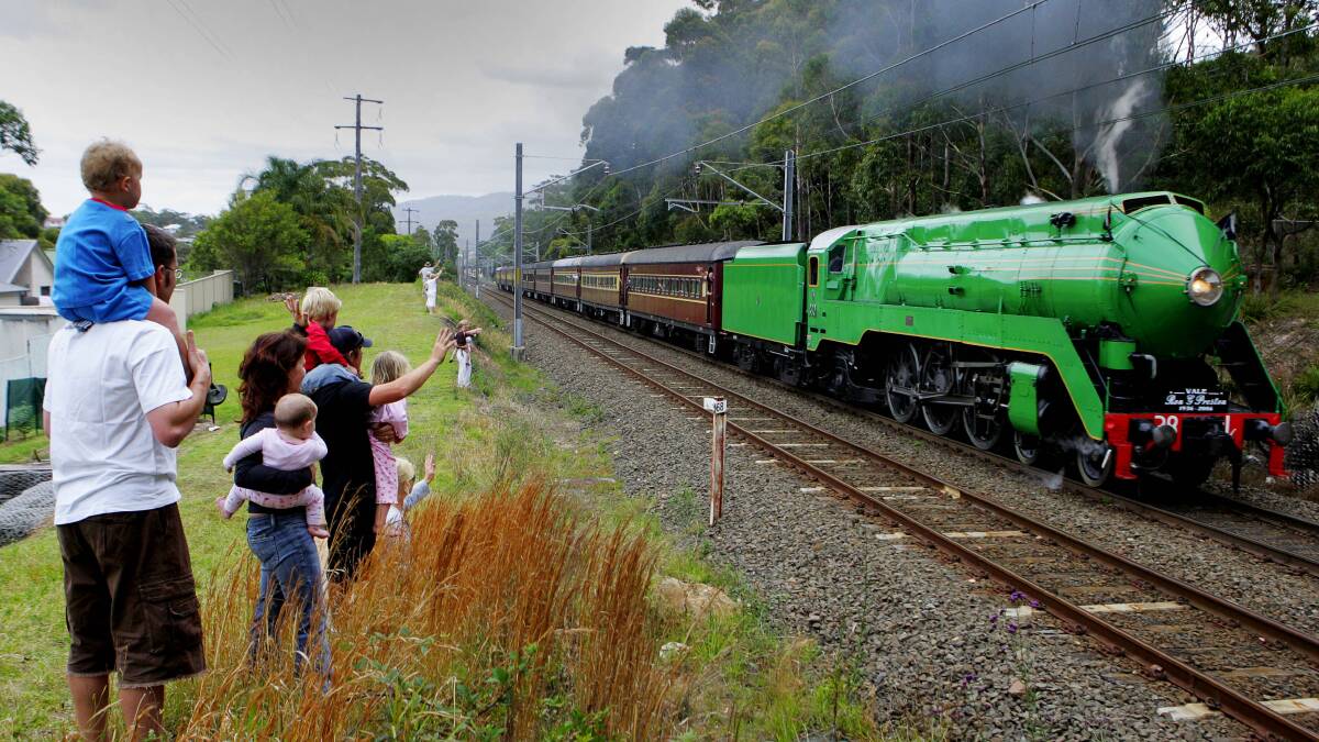 Green machine: The 3801 locomotive running through Austinmer on the Cockatoo Run in 2006 before it was taken off the tracks. This locomotive is no longer operated by the volunteer group 3801 Ltd, which itself has now been locked out.