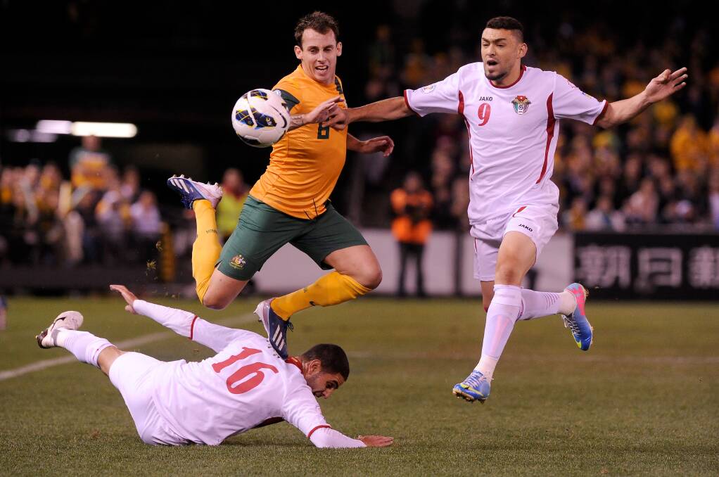 Back home: Australia's Luke Wilkshire against Jordan in 2013. Picture: Sebastian Costanzo