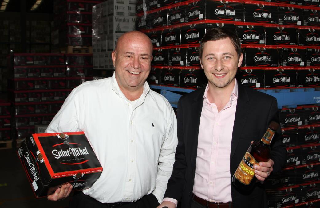 Michael and John Kollaras inside the warehouse at Albion Park Rail. Picture by Greg Ellis.