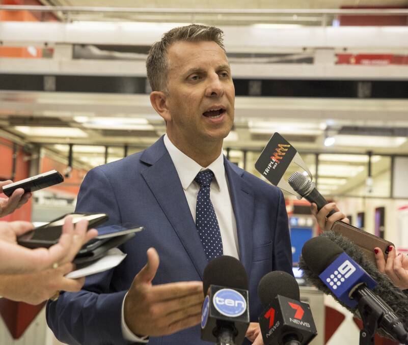 Transport Minister Andrew Constance said a half-hour cut to the Wollongong-Sydney rail trip would simply be too expensive. Picture: Jessica Hromas