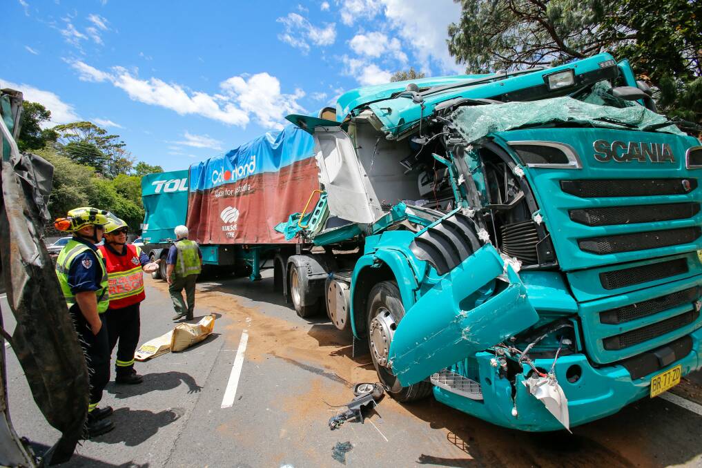 One of two truck accidents in a week that closed the M1 Princes Motorway at Mt Ousley. Roads and Maritime Services is reviewing safery provisions along the motorway. Picture: Adam McLean