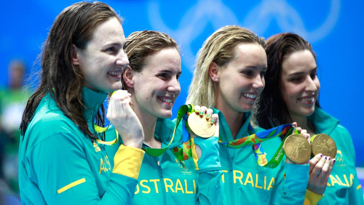GOLDEN GLOW: Emma McKeon (third from left). Picture: Getty Images