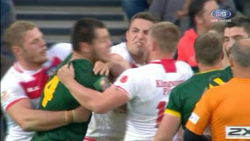 Throw 'em: Sam Burgess lashes out at David Klemmer in the Four Nations. Picture: Channel Nine