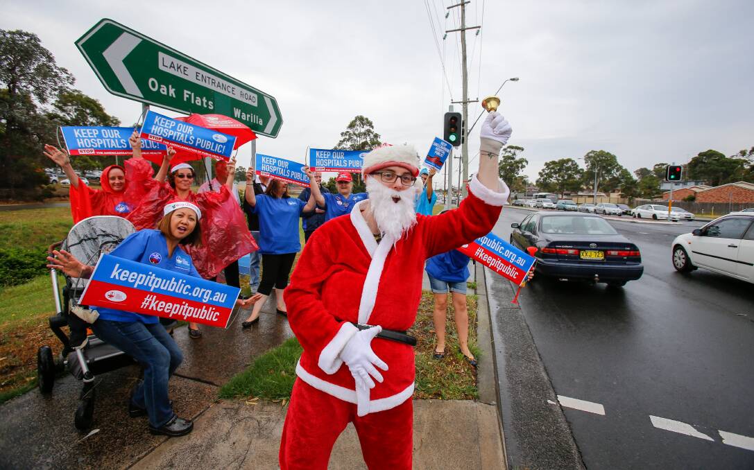 Festive spirit: Concerned Shellharbour Hospital staff rallied against plans to part-privatise the facility on Tuesday morning. Picture: Adam McLean 
