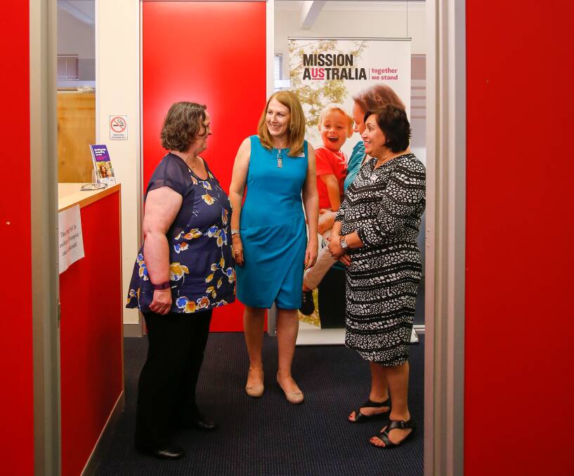 Mission Australia CEO Catherine Yeomans (centre) talks homelessness with Nowra-based staff Liz O'Connell and Violet Green in Wollongong. Picture: Adam McLean