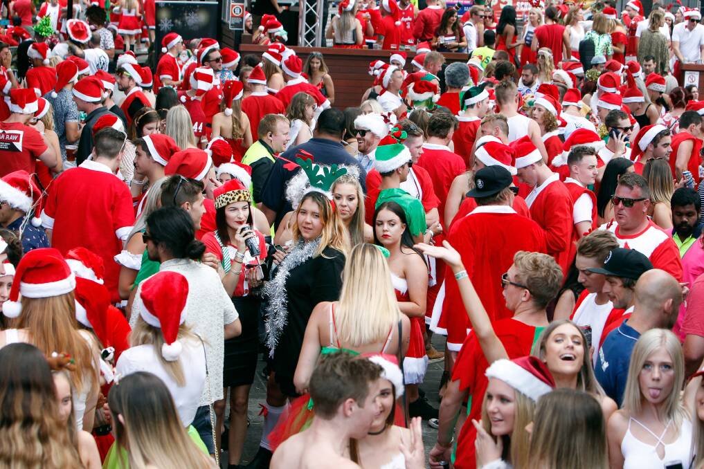 SEA OF SANTAS: The pub crawl has grown from a small charity event to raising more than $110,000 for the Salvation Army in 2016. Picture: Sylvia Liber