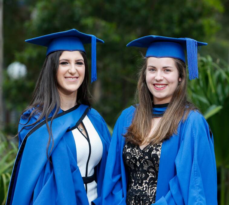 IT'S AN HONOUR: Timia Osman and Taylah Brennan, Bachelor of Medical Physics. Picture: Adam McLean.
