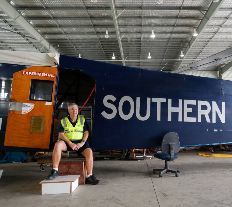 SEMI-RESTORED: While the restoration hanger is closed this weekend, regular tours from Phil Mason visit aircraft like the replica of the Southern Cross. Photo: Adam McLean.