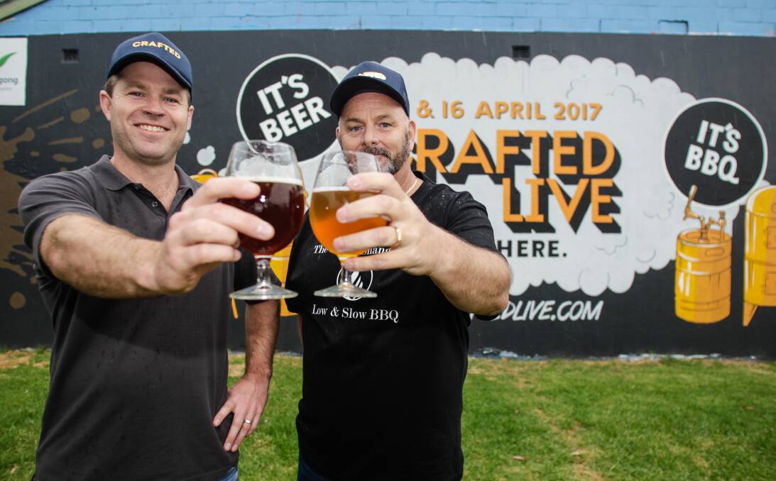 CHEERS: Crafted Live founder Simon Rollin (with BBQ enthusiast Craig Sheen) hopes the Illawarra community comes out to support the Easter event so it can be added to Wollongong's annual calendar. Picture: Georgia Matts