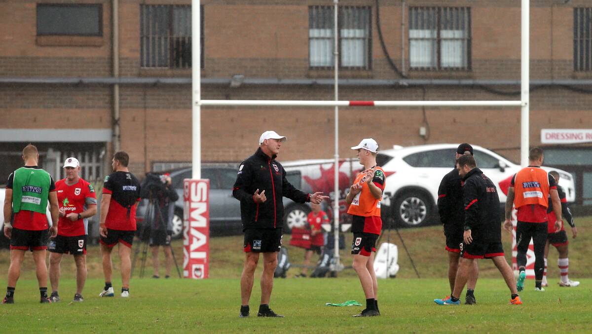 GAME PLAN: Coach Paul McGregor and young playmaker Jai Field talk during training at WIN Stadium on Wednesday. Picture: Sylvia Liber