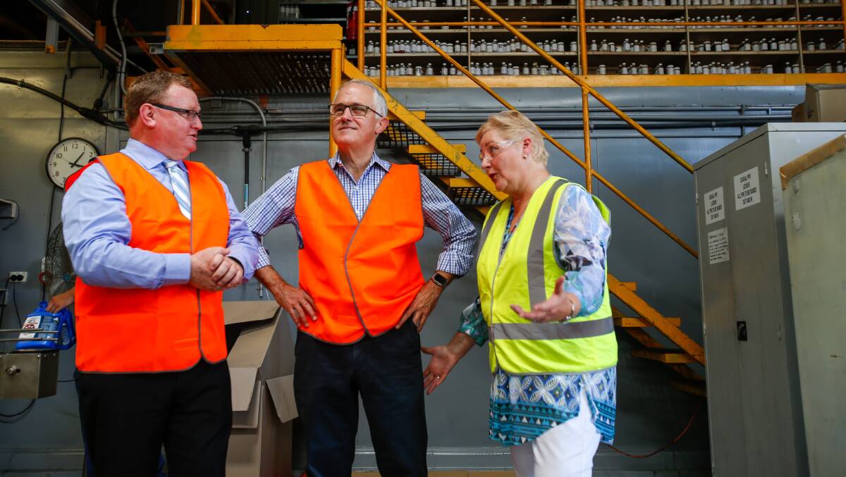 Malcolm Turnbull and Gilmore MP Ann Sudmalis speak with NowChem managing director John Lamont during a visit to the chemical manufacturer. Picture: Adam McLean