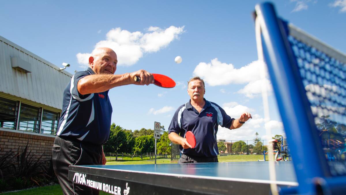 EYE ON THE BALL: Walter Chichkan and Alan Russell have been long-time members of the Illawarra Table Tennis Association, which celebrates its 70th anniversary in 2017. Picture: Georgia Matts