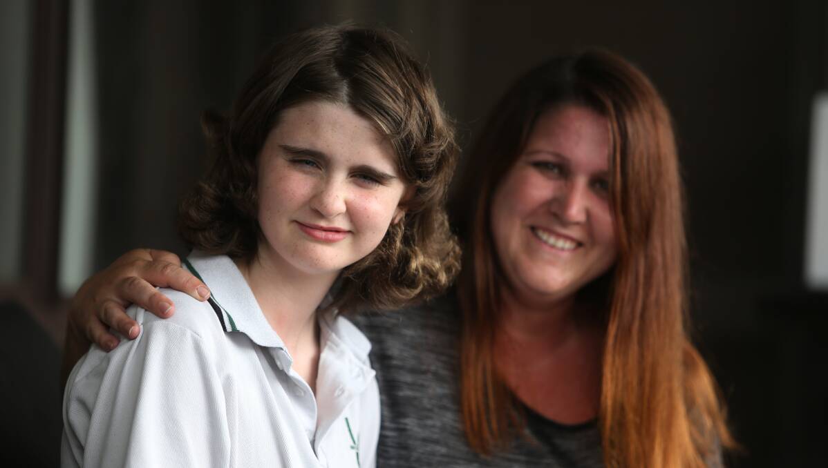 ​Welcome support: Fifteen-year-old Grace Barnett, with her mother Kelly Bonanno, has received a grant from the proceeds of last year's i98FM Illawarra Convoy. Picture: Robert Peet