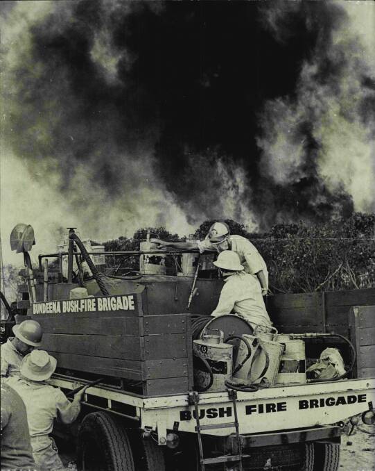 Members of the Bundeena Bushfire Brigade in action as a wall of fire approaches the Bundeena road. January 13, 1965. Picture: Fairfax File