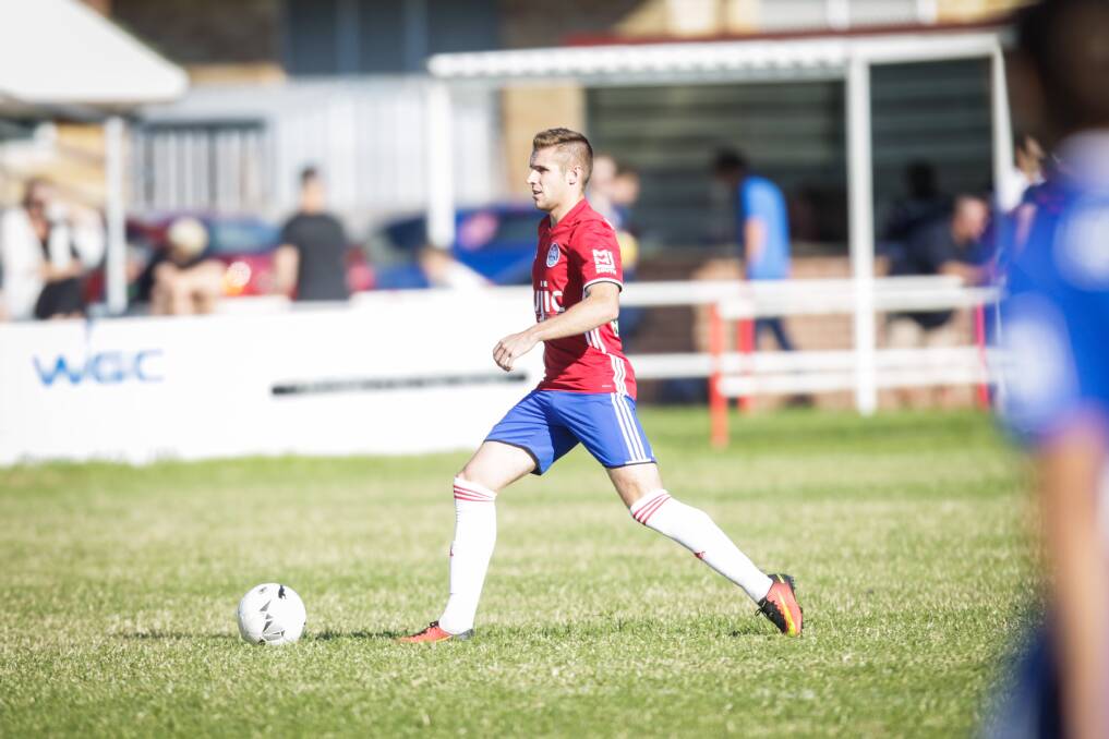 TURN IT AROUND: Albion Park's Mark Every dribbles the ball. His White Eagles side face Wollongong United on Tuesday afternoon. Picture: GEORGIA MATTS