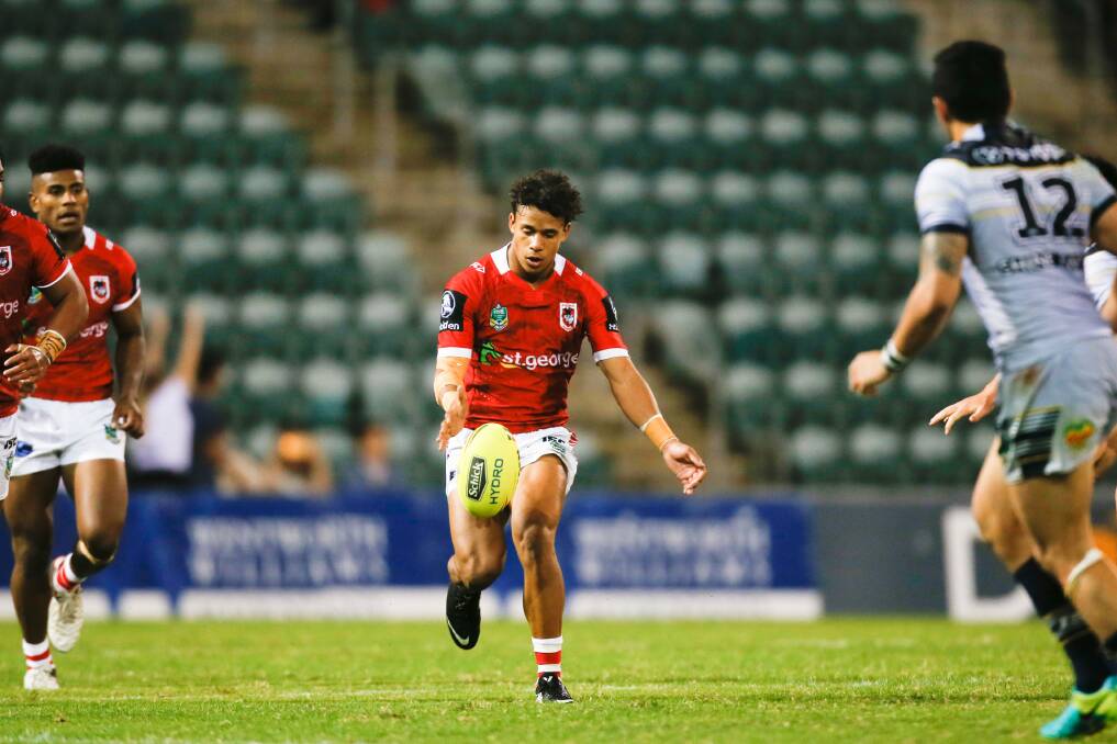 Tristan Sailor kicks ahead in the Dragons NYC's 40-6 loss to the Cowboys
