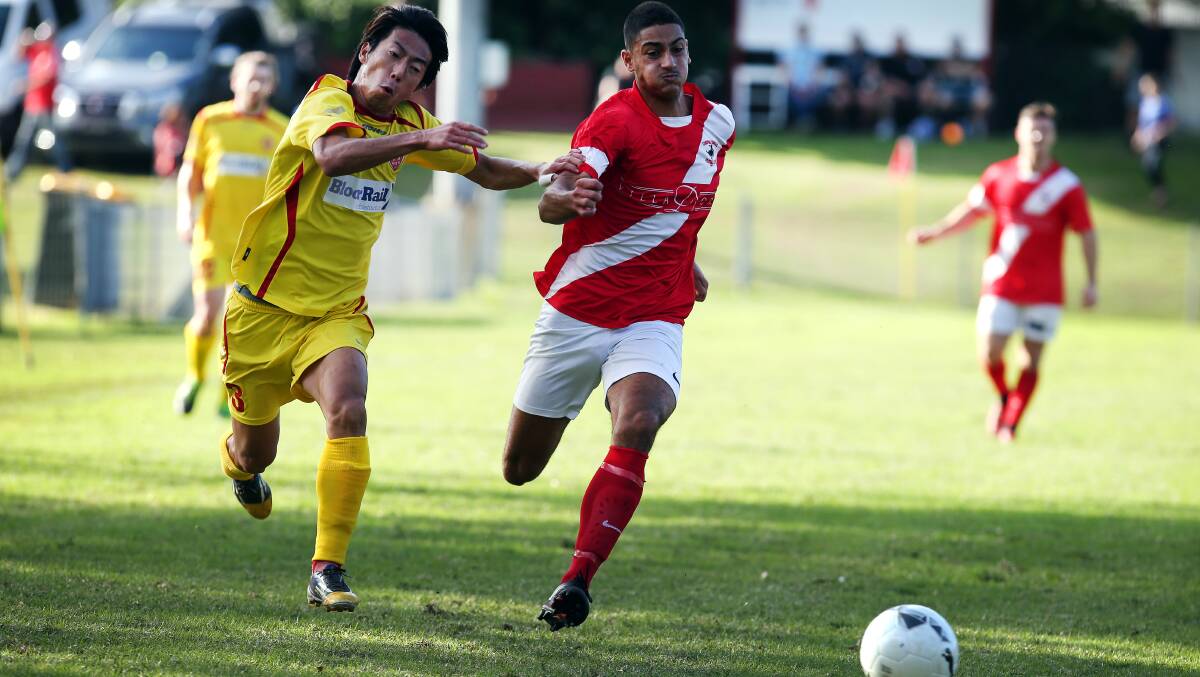 STARTING POINT: Wollongong United's Daisuke Yuzawa battles for possession against Corrimal Rangers last year. Both clubs play Frat Cup games this week. Picture: Sylvia Liber