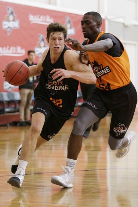 On the rise: Wollongong's Kyle Zunic drives to the basket at the NBL Combine at Melbourne Sports and Aquatic Centre on Tuesday. Picture: Darrian Traynor/Getty Images