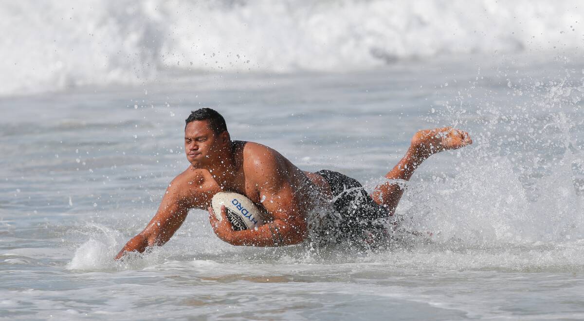 Making waves: Dragons forward Luciano Leilua at Wollongong beach. Picture: Adam McLean
