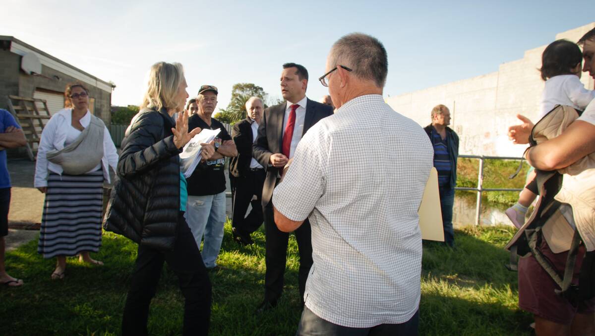 FED UP: Residents of the southern part of Wollongong City vent their frustrations yesterday to Labor candidate Paul Scully. Georgia Matts.