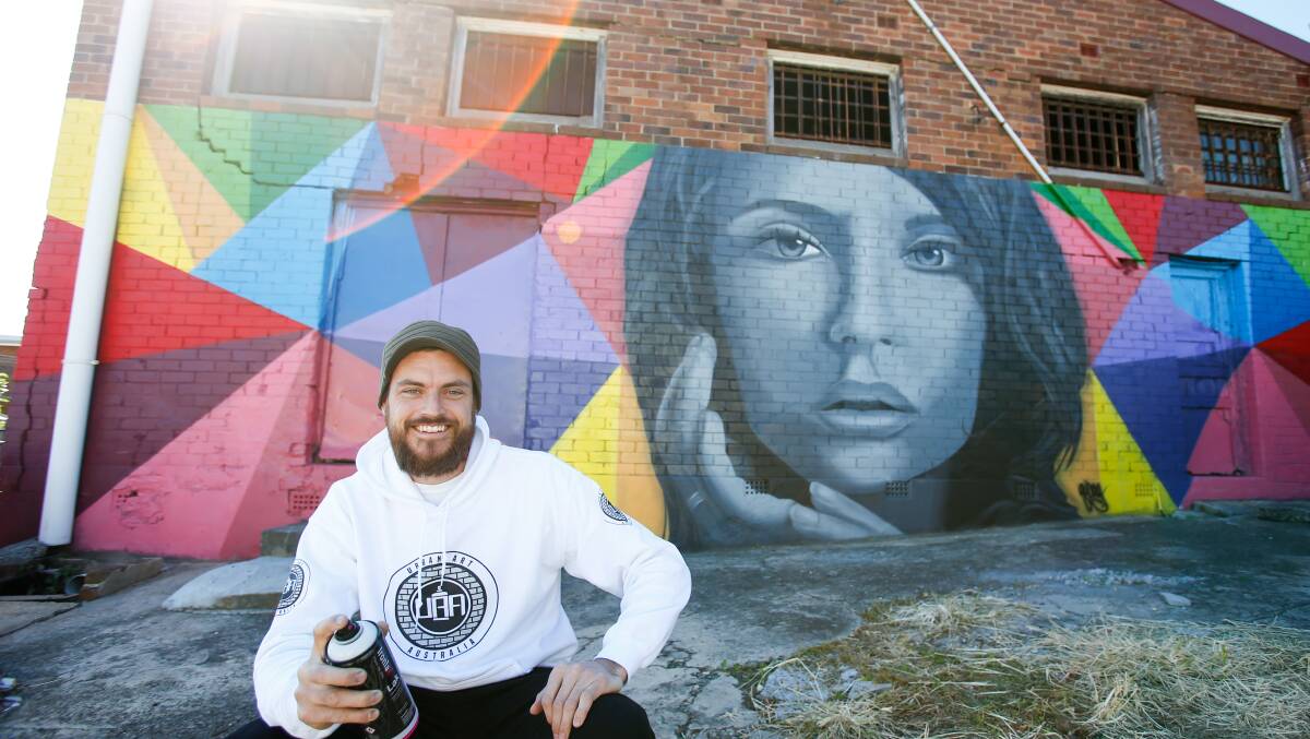 INSPIRED: Anthony Jones wants to spruce up Wentworth Lane in Port Kembla. Artists or wall-owners wanting to help should contact him via www.urbanartaustralia.com.au Picture: Adam McLean