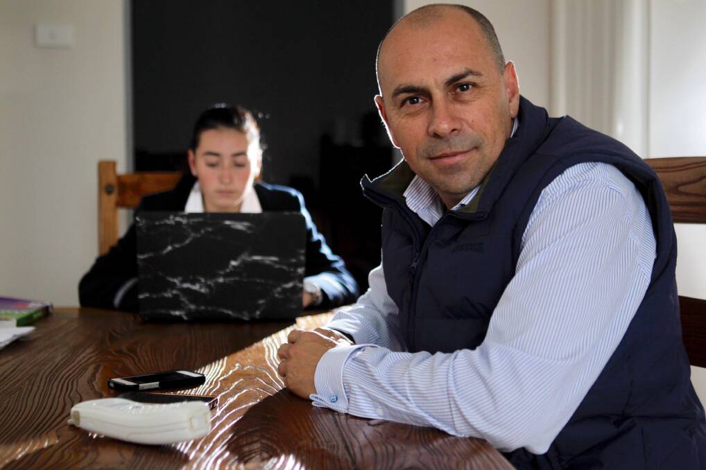 Back on: Warrawong's David De Freitas will have his internet reconnected while issues with transferring to the NBN are sorted out. Picture: Adam McLean. 
