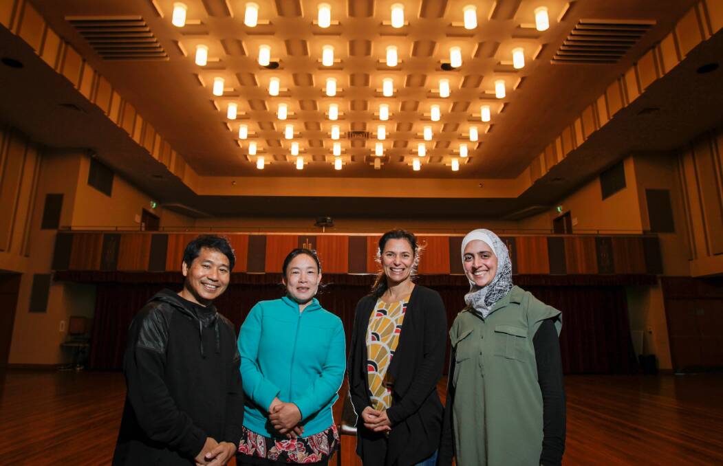 IN HER SHOES: ​Francis Htjaru, Bawmeh Bird, Lillian Rodrigues-Pang and Wafaa Izz Eddin share their stories in an audio exhibition at Wollongong Town Hall, part of Refugee Week. Picture: Adam McLean