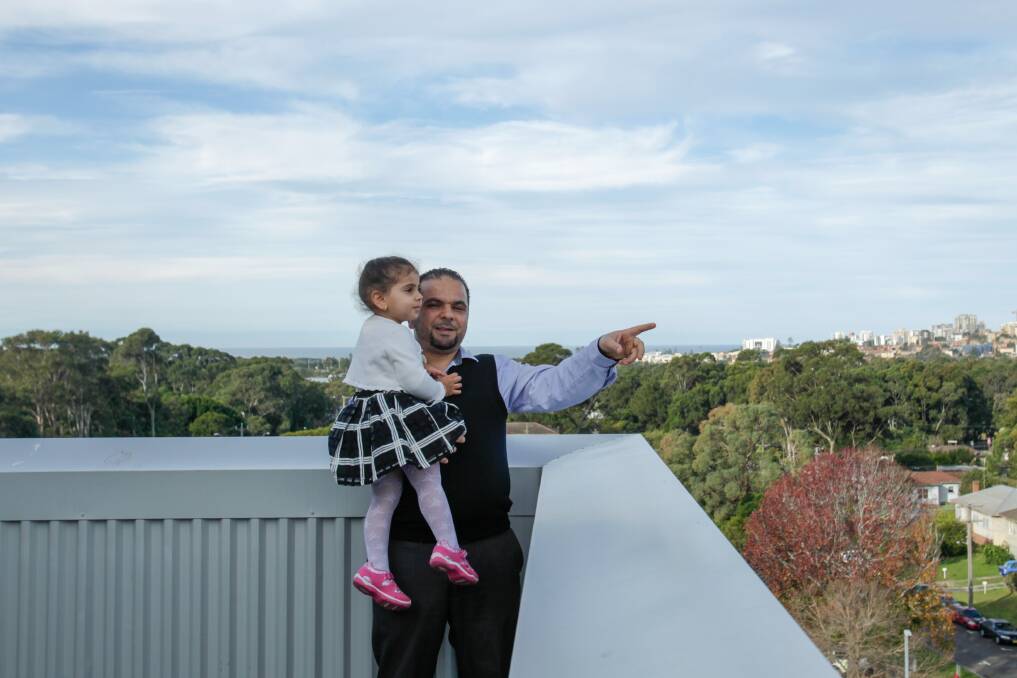 GREAT VIEWS: Faisel Tubbal and his daughter Baraa, 3. Picture: Adam McLean