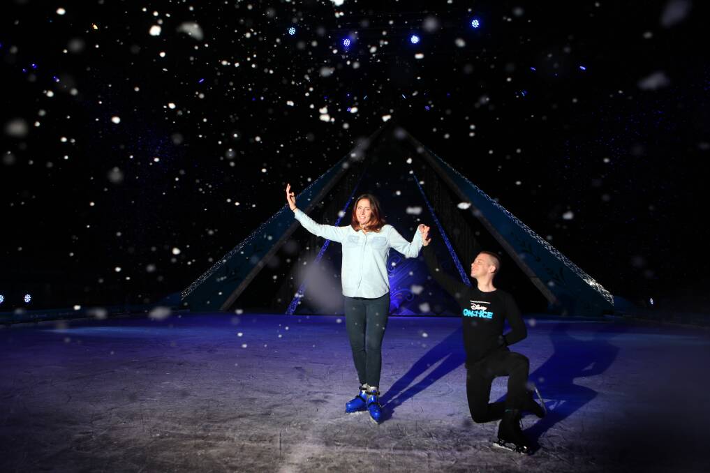 LET IT SNOW: Jeremie Boisier teaching Desiree Savage to ice-skate on the rink used for the Disney On Ice production at the WIN Entertainment Centre. Picture: Sylvia Liber