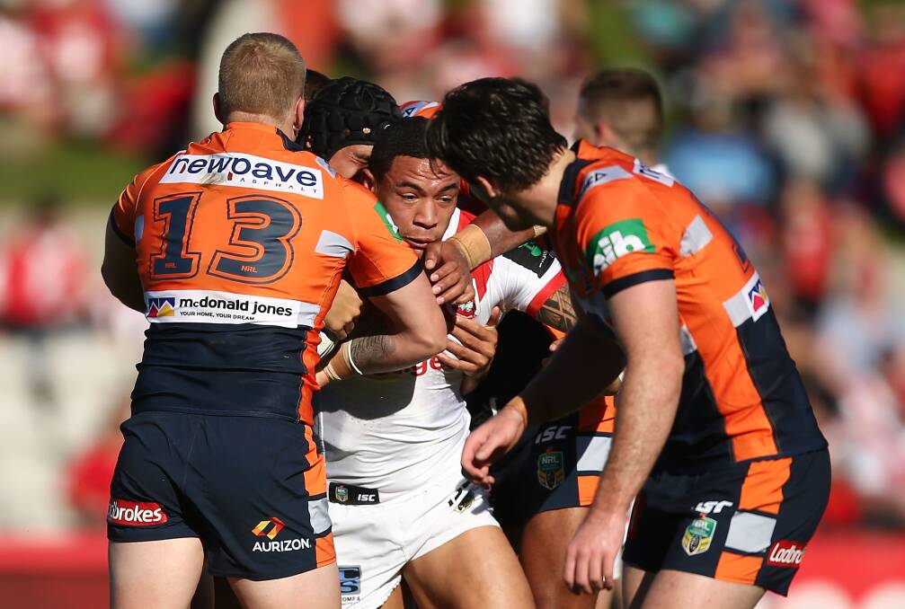 Warhorse: Tyson Frizell takes on the Newcastle defence during Sunday's NRL clash at Kogarah. Picture: Mark Metcalfe/Getty Images