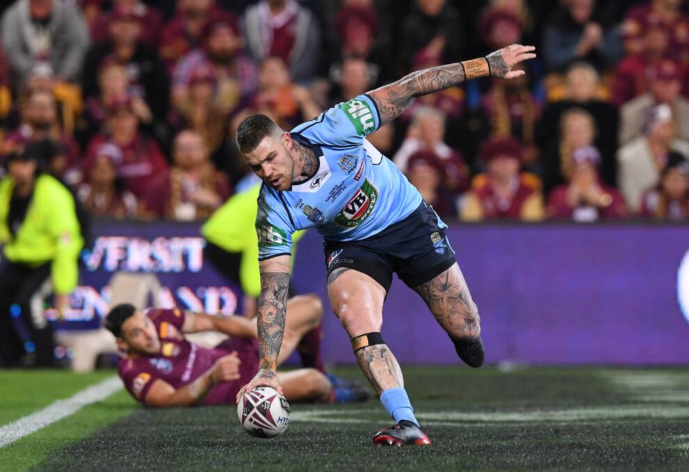 Battered and Blue: Josh Dugan. Picture: AAP Image/Dave Hunt