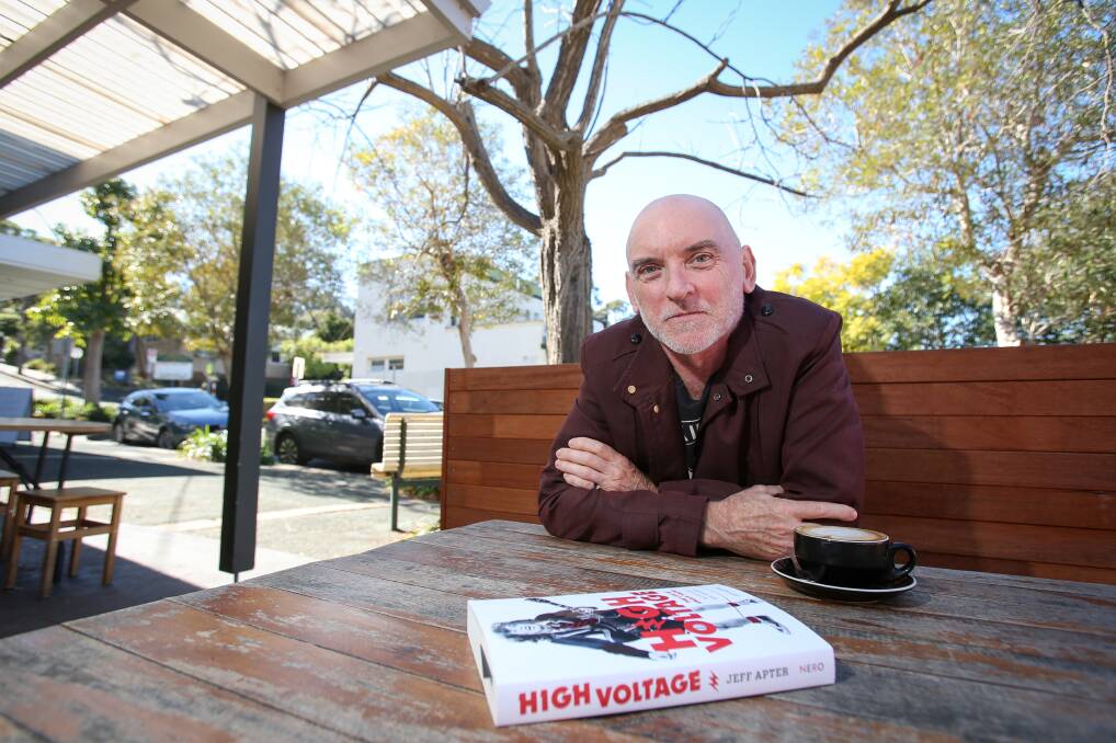 Keiraville author Jeff Apter with his book 'High Voltage: The Life of Angus Young'. Picture: Adam McLean