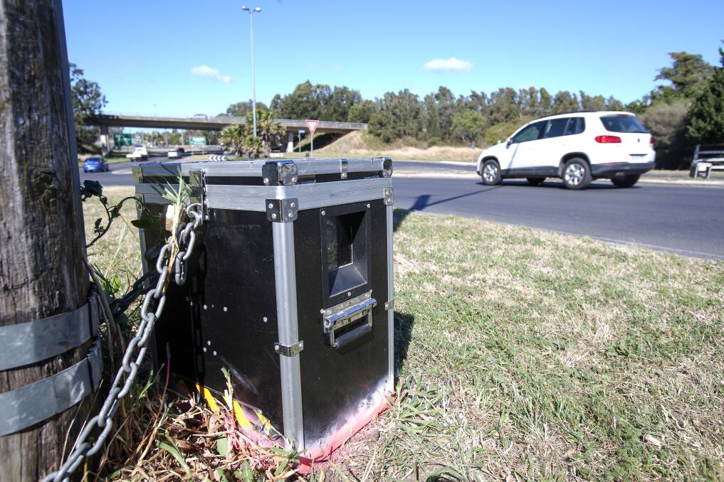 Mysterious black boxes - like this one at Northcliffe Drive near the M1 Princes Motorway - have been popping up in the Illawarra. Picture:  Adam McLean