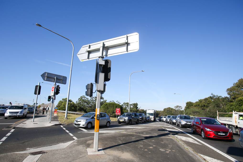 traffic jam: Roads and Maritime Services is adding an extra lane to the notorious bottleneck at the intersection of the Princes Highway and Memorial Drive at North Wollongong. Picture: Adam McLean