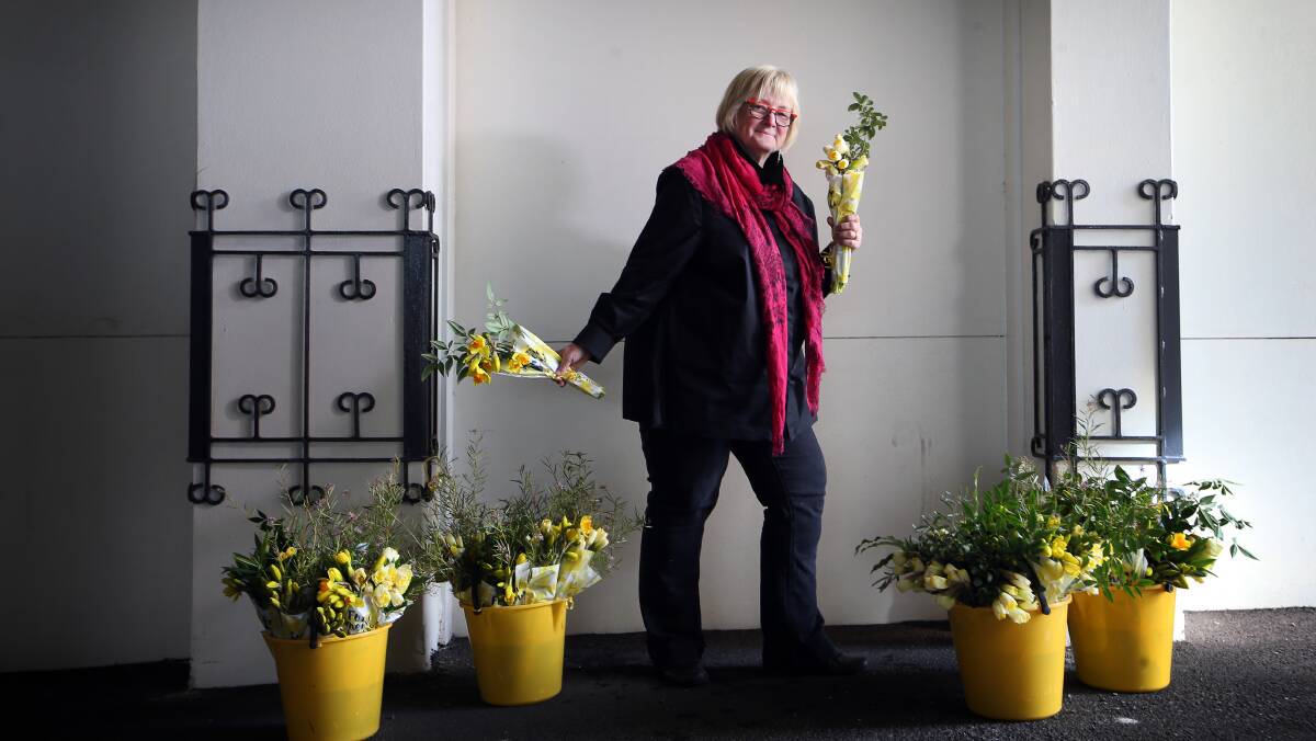 VOLUNTEER: Daffodil Day volunteer Jenny Bayly is encouraging people to support the day and buy daffodils and other merchandise on Friday to raise much needed funds for the Cancer Council. Picture: Sylvia Liber