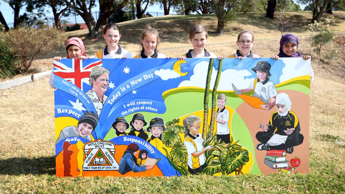 MURAL: School students Maryam Ahmed, Freja Reinfelds, Emily Howarth, Campbell Rogers, Kyra CLarke and Ayat Abdul Husein. Picture: Sylvia Liber