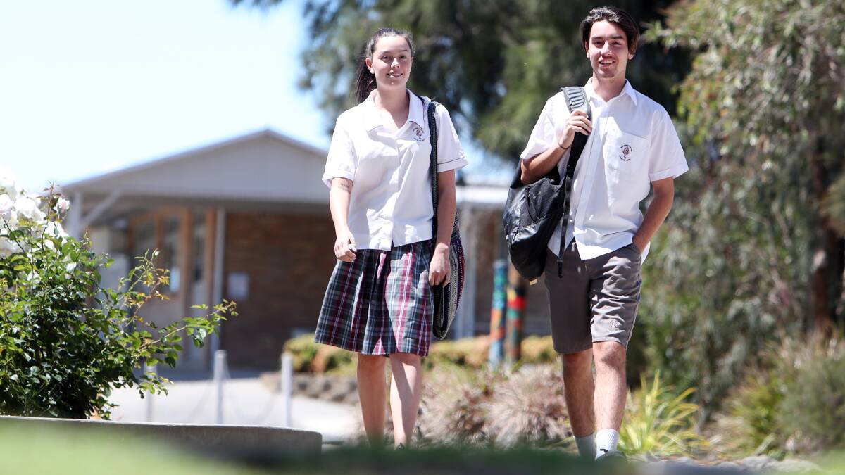 TWIN ASSAULT: Scarborough twins and Holy Spirit College students Gabi and Darcy Jordan are doing their HSC. Picture: Sylvia Liber