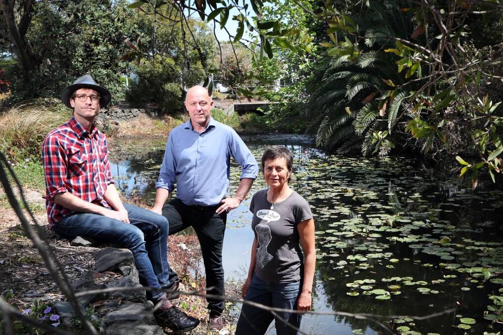 'Socially engaged' artists Lucas Ihlein,Brogan Bunt and Kim Williams in a creek next to Wollongong Golf Course. Picture: Sylvia Liber