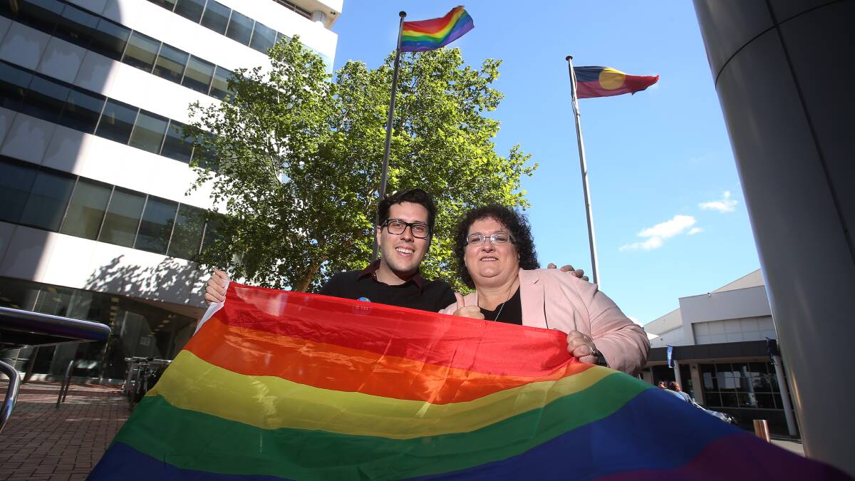 PROUD DAY: Nathan Brown and his mother, Wollongong councillor Tania Brown were ecstatic with the decision to fly the rainbow flag at Wollongong City Council headquarters. Picture: Robert Peet