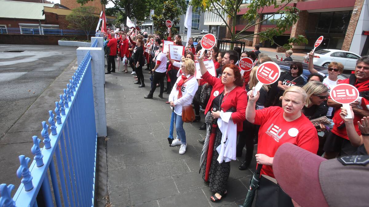 Catholic teachers and staff protest out the front of the Catholic Education Office in Wollongong on November 6. Picture: Robert Peet