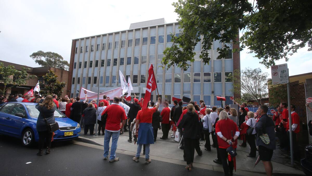 CATHOLIC TEACHERS STRIKE FOR RIGHT TO ARBITRATE: Hundreds of Catholic teachers and staff rally at the front of the Catholic Education Office in Wollongong on November 6. Picture: Robert Peet