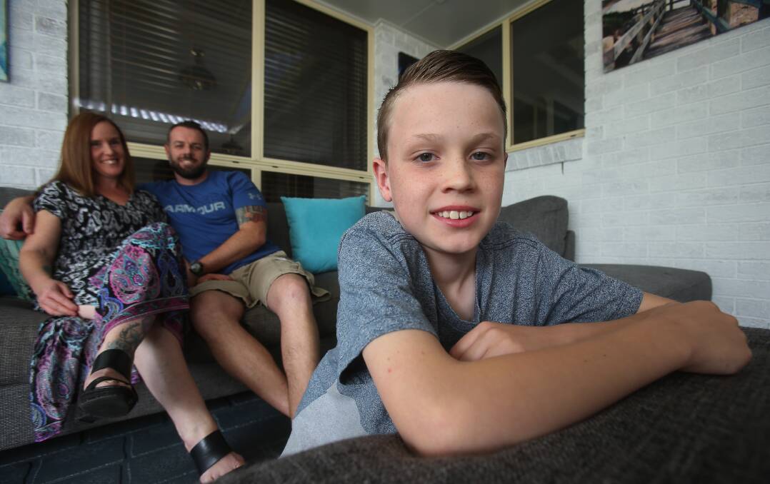 Rough road: It's taken years to find the best medication for Albion Park 11-year-old Dominic Bennett - pictured with parents Nakia and Ian - who was diagnosed with childhood absence epilepsy when he was five. Picture: Robert Peet