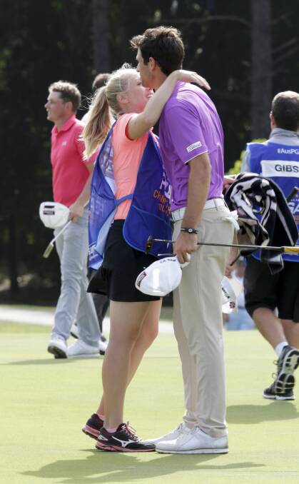Jordan Zunic gets a hug from caddy and girlfriend Olivia Marlow. Picture: AAP Image/Tim Marsden