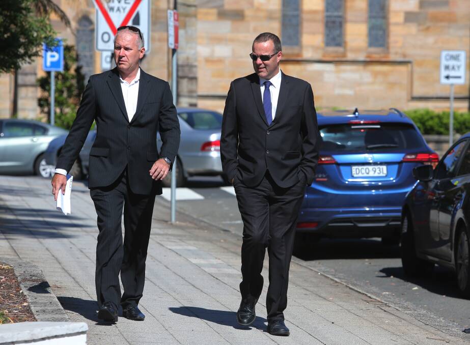 Jail-bound: Disgraced ex-Steelers Club general manager Scott Miles (right) attends Wollongong courthouse with a supporter on Monday for his sentence hearing. Picture: Robert Peet