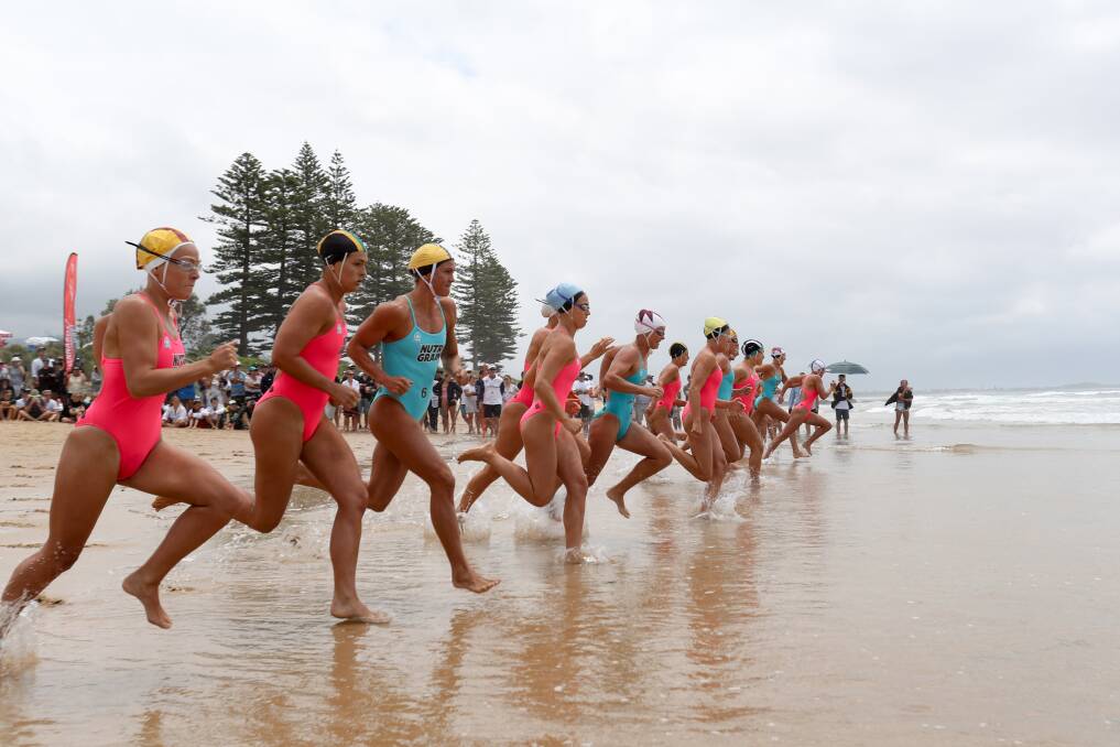 READY, SET, GO: Heat One of the girls Ironwoman begins on North Wollongong Beach. Picture: ADAM McLEAN