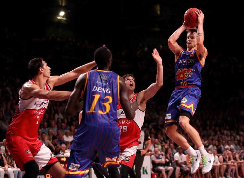 IN FLIGHT: Nathan Sobey of the Adelaide 36ers scores during their win over the Hawks. Picture: AAP