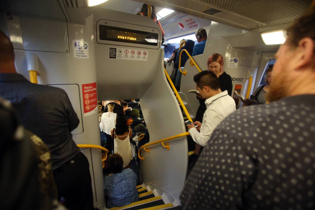 The already-crowded train just after leaving Wollongong at 6.40am. Picture: Robert Peet