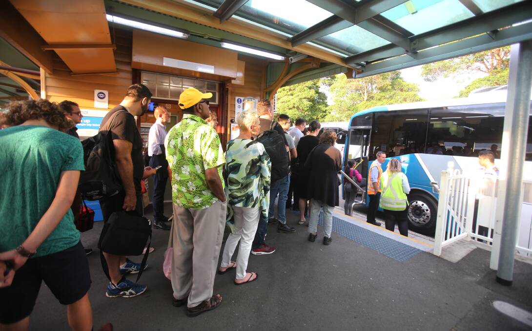 Rather than push their way onto a crowded train at Thirroul some commuters opted for an express bus to Central.