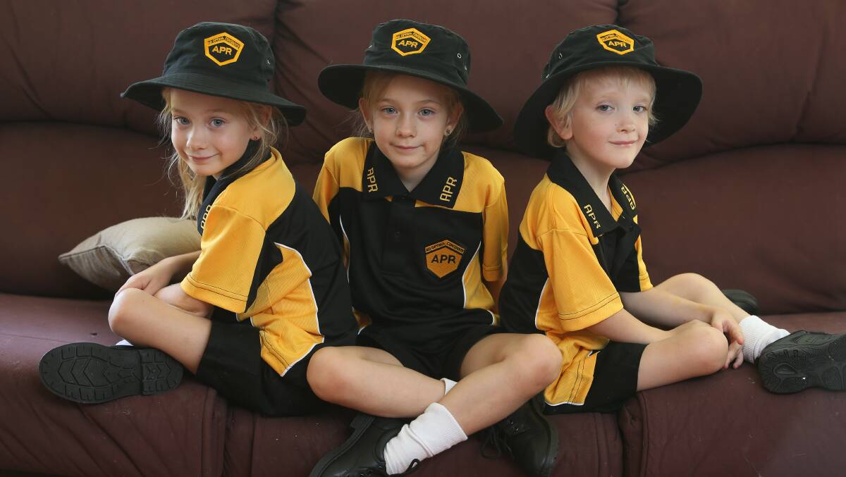 Albion Park triplets Sapphire, Brianna and Cooper Smith start kindergarten on Tuesday. Picture: Robert Peet